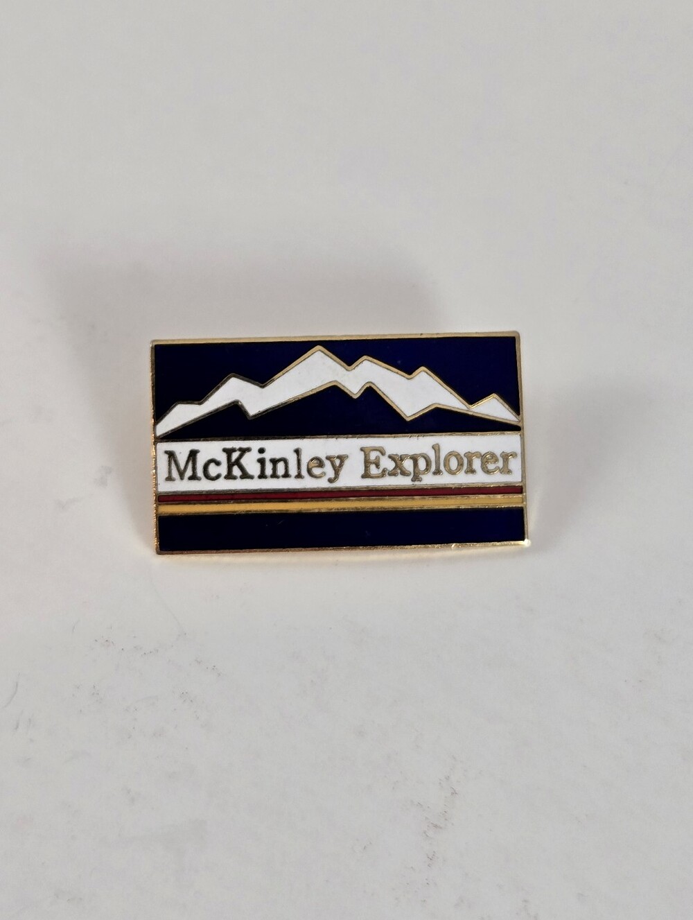 Vintage McKinley Explorer train enamel pin